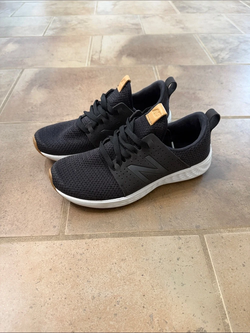 Reposhing—- New Balance Black Knit Sneakers with Brown Accents